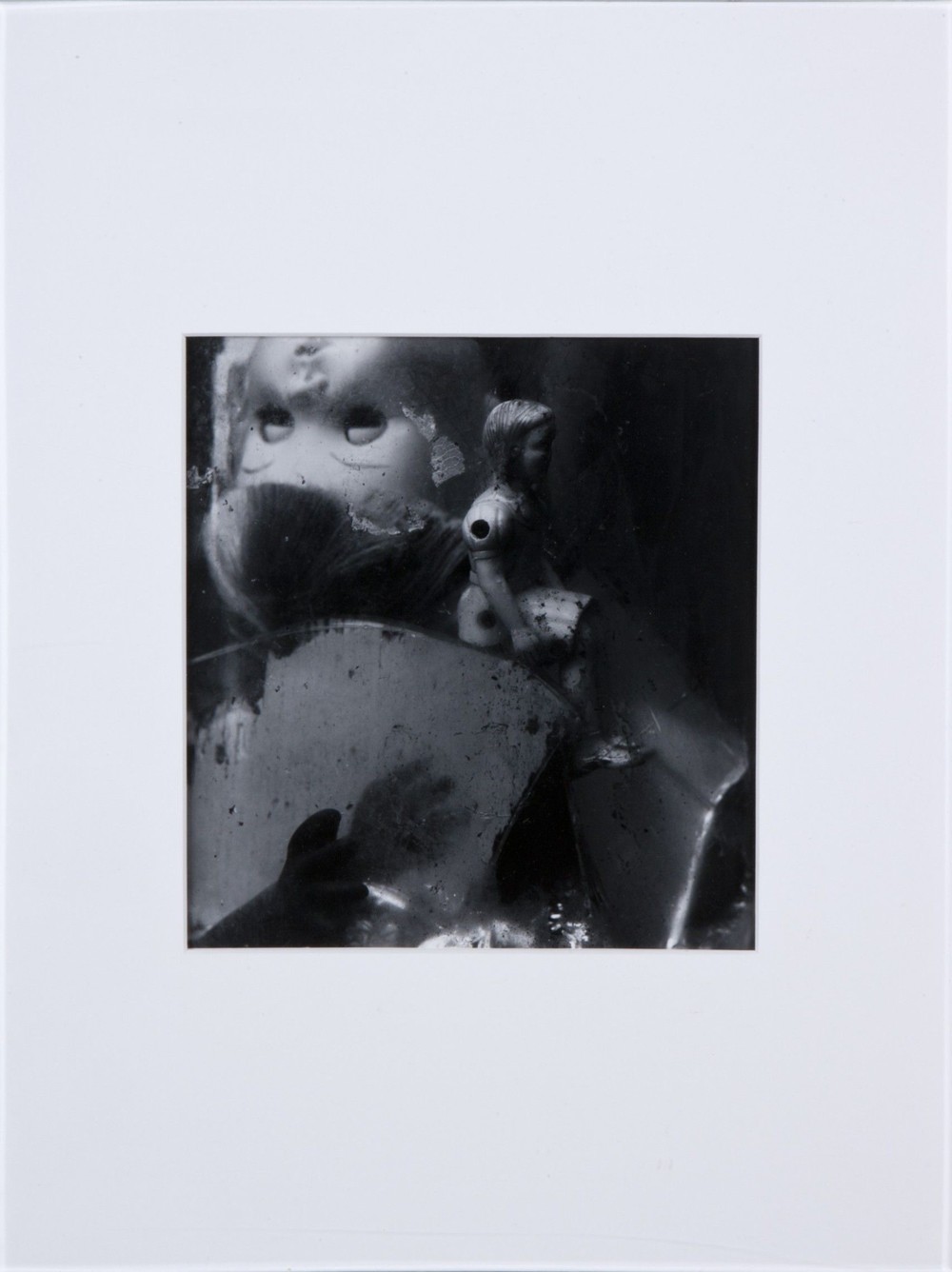 Untitled
still life with dolls under glass